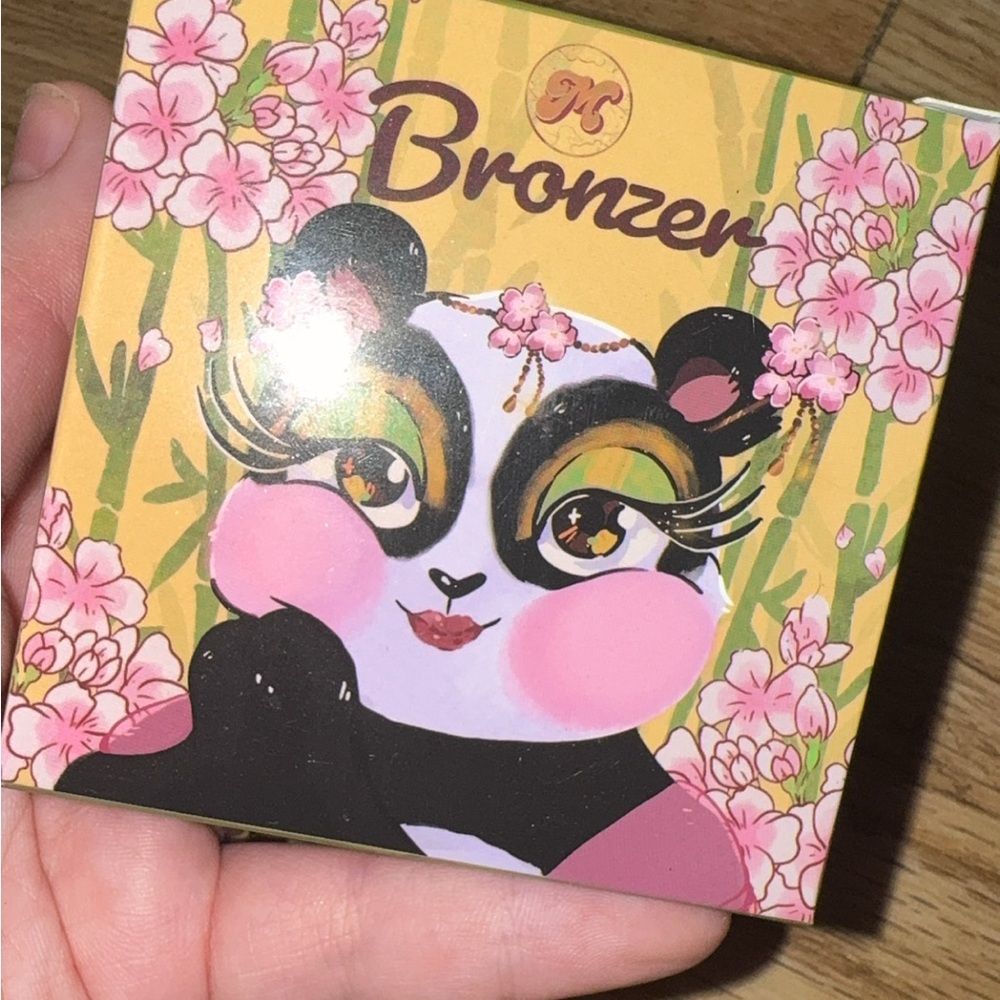 Bronzer with Pink and Black Panda Design